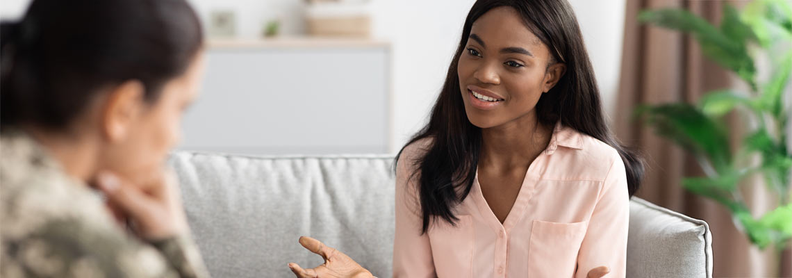 therapist counselling depressed military female