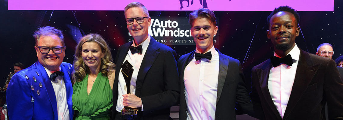 The Zurich team with Alan Carr and their award