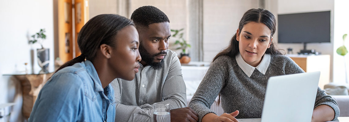 Adviser speaking to a couple