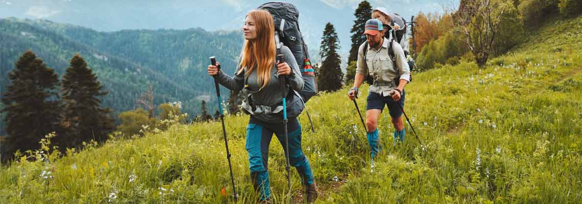 parents hiking with child