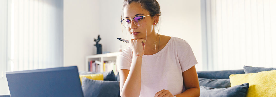 young woman using her laptop
