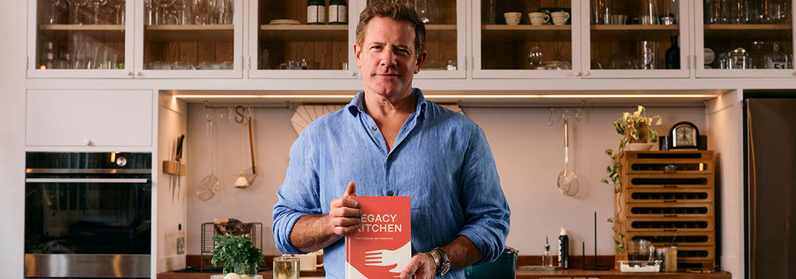 Matt Tebbutt with the Legacy Kitchen cookbook