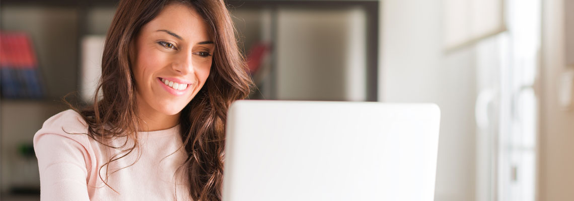 young businesswoman using laptop