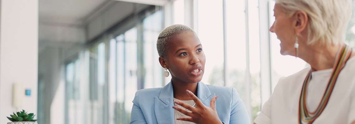 Adviser speaking with a client