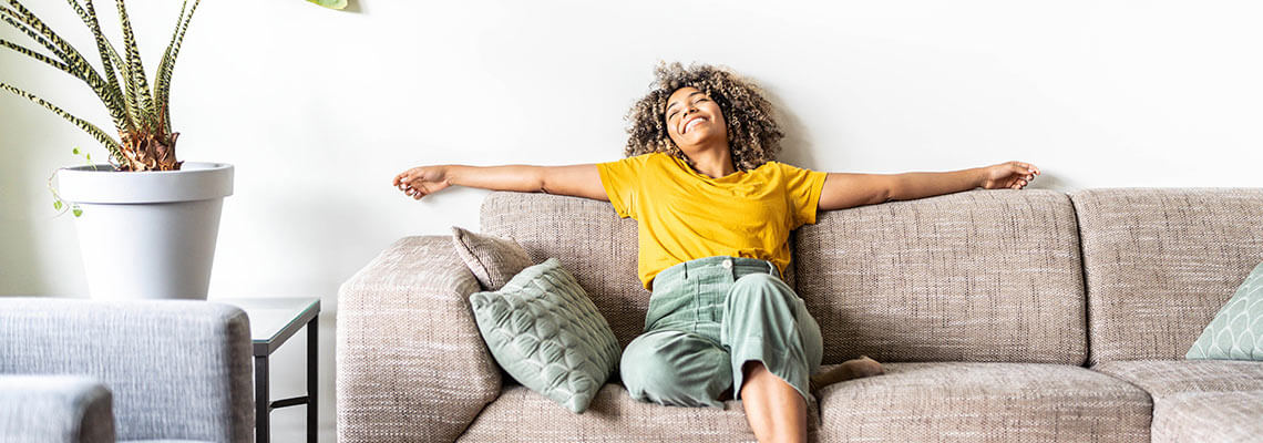 Woman relaxing in her home